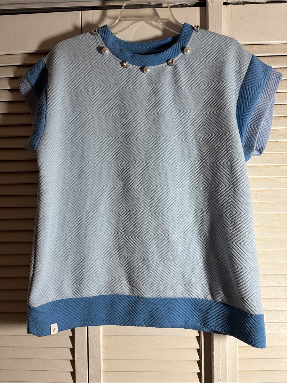Light Blue Textured Short-Sleeve Top with Blue Trim